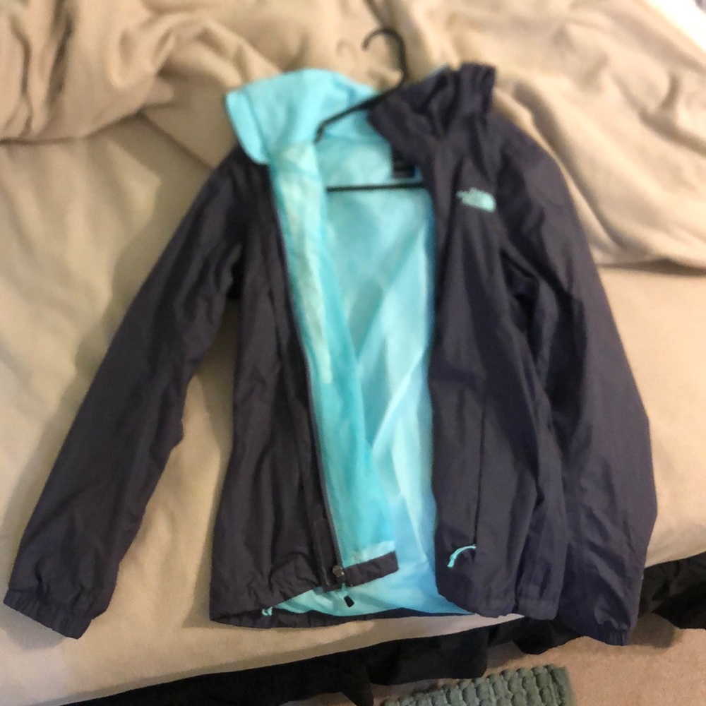 Grayish/purple and teal north face raincoat